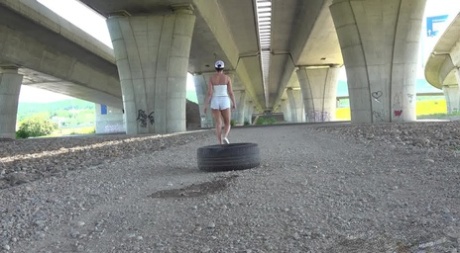 Short taken girl Chloe Lamour takes a badly needed piss underneath an overpass