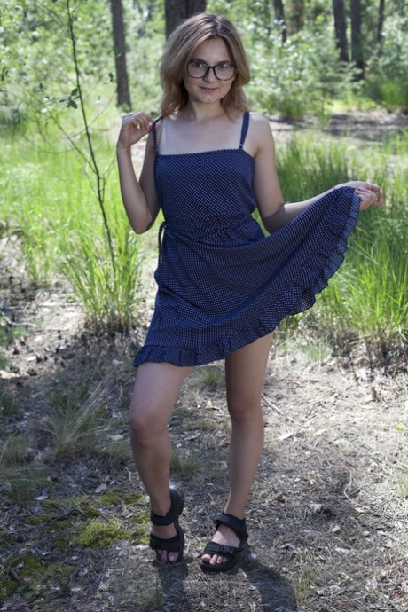 Nerdy Teen Mia Takes Off Her Glasses And A Dress To Model Naked In The Woods