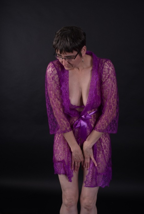 Model with short hair, but while wearing purple lingerie, the older man appears to be sporting short haircuts.