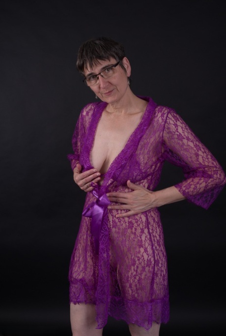 Short hair is a common trait among older people who model in purple lingerie.