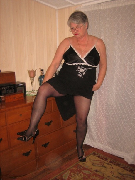 Overweight Nan Girdle Goddess Strips To Her Footwear In Front Of A Dresser