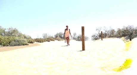Solo Girl Chloe Lamour Takes A Big Piss While Crossing A Patch Of Sand