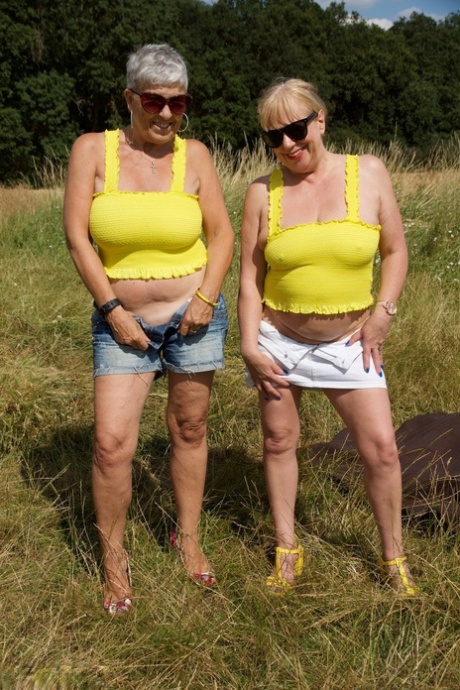 Old Lesbians Bare Their Butts And Twats In A Field While Wearing Sunglasses