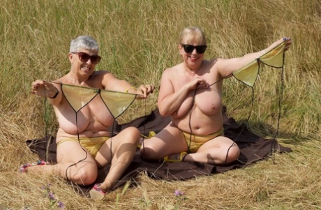 Old Lesbians Catch Rays On Their Large Breasts While Sunbathing In A Field