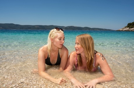 Younger and older women encounter lesbian sex while on the beach.