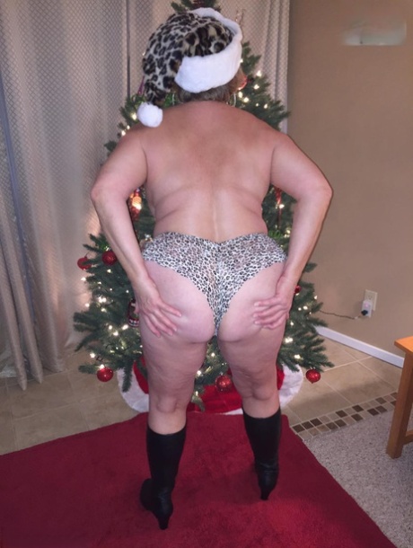 During the Christmas tree dressing, an overweight woman named Busty Bliss stops for oral sex.