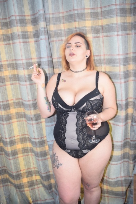 Tattooed BBW Smokes And Drinks While Peeling Off Her Lingerie