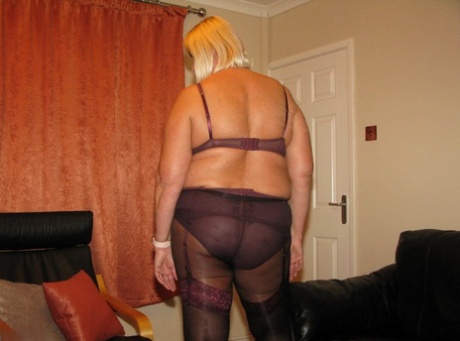 A leather loveseat and BBW Chrissy Uk with an older blonde bodysuit and pantyhose.