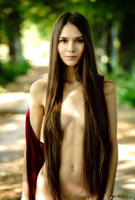 Solo Girl With Long Hair Leona Mia Gets Naked On A Bench On A Tree-lined Drive
