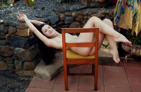 Naked moment: Sweet Hayli Sanders poses on a garden patio.