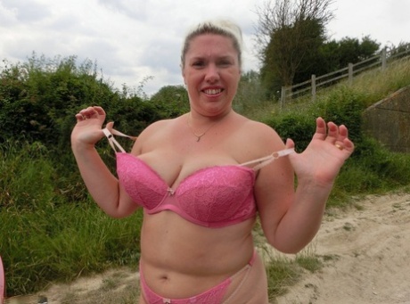 The overweight body of blonde Barby is revealed to the world around her home in a rural location.