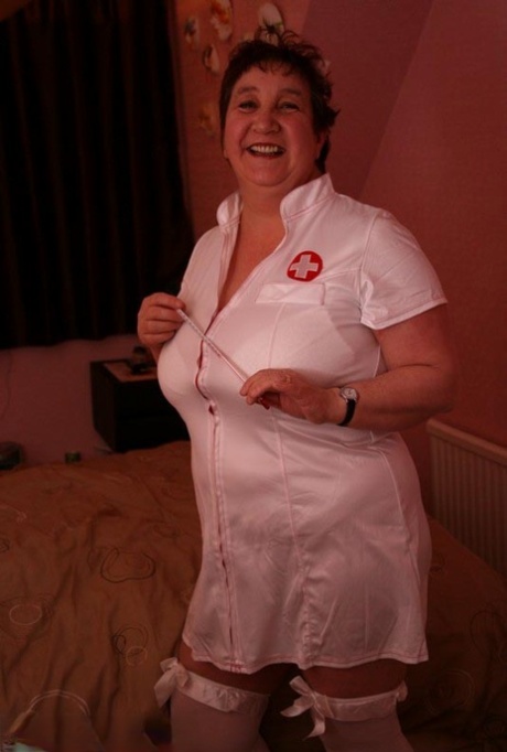 The young amateur wears a nurse outfit as Kinky Carol, who then gets on top of the man.