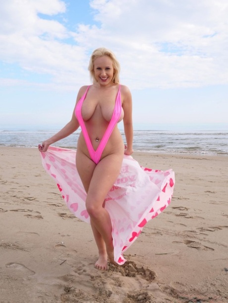 Natural Blonde Angel Wicky Releases Her Big Boobs From Swimwear On A Beach