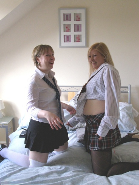 Before lesbian sex, thick amateurs work without schoolgirl uniforms.