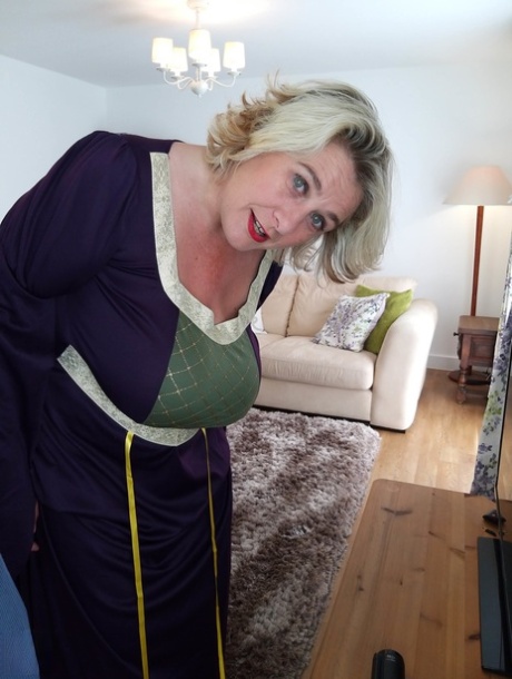 Older Blonde Wears Stockings While Having Sex On A Living Room Rug