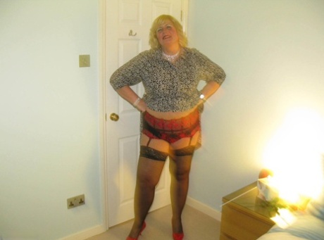 Mature BBW Chrissy Uk abandons topless but slides in sheer panties.