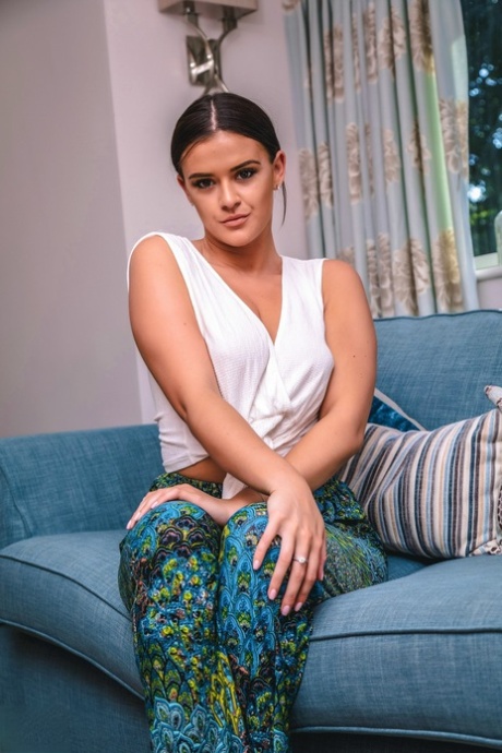 UK Teen Brook Wright Uncovers Her Natural Tits While Getting Naked On A Sofa