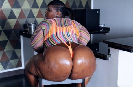 Black Amateur Puts Her Massive Butt On Display In A Thong
