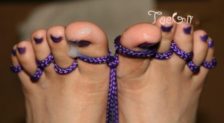 Girl With Pretty Feet Has Her Toes Tied Up With Rope Before Giving A Footjob