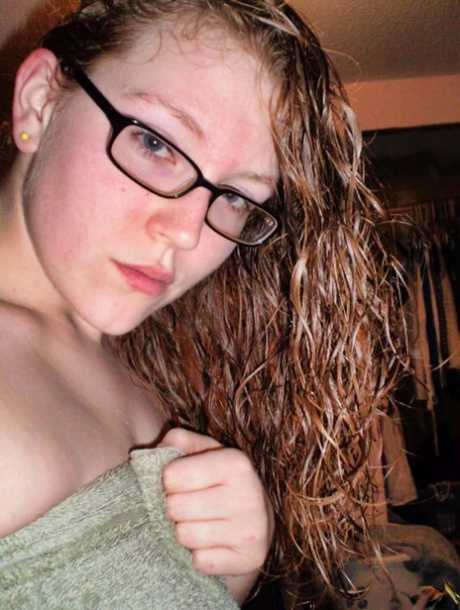 Teenager Sienna D takes a naked walk while taking selfies.