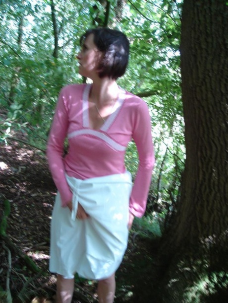 During a hike in the woods, Slut Scot Susan releases her penis and gives a blowjob.