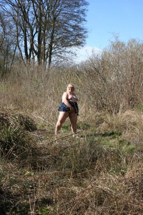 Obese Blonde Lexie Cummings Has Sex While On A Bank In The Country