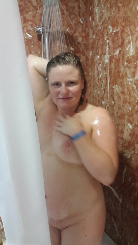 Amateur Chick Flashes Her Tits In Public Before Taking A Shower At Home