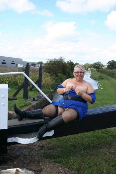 An obese British woman named Lexie Cummings is seen dilding her pussy in an animal sanctuary.