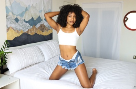 Ebony Chick Olivia Jayy Sports An Afro While Having POV Sex On A Bed