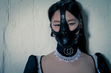 Korean Model Poses For A Solo Shoot In A Naughty Rubber Maid Outfit