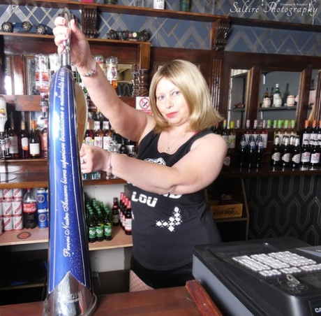 Despite her topless and big-tipped appearance, Posh Sophia the older blonde is seen in a bar shooting pool with a topless hand.