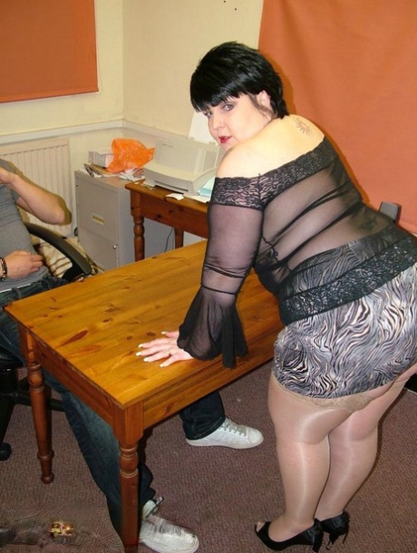 The dark-haired BBW Double Dee performs an orgasm and is then flung over a table.