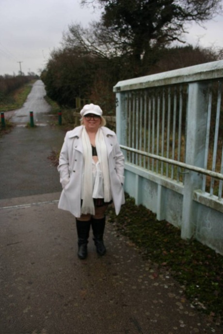 Lexie Cummings, who is a fat UK resident, displays her large anus on a pedestrian bridge.