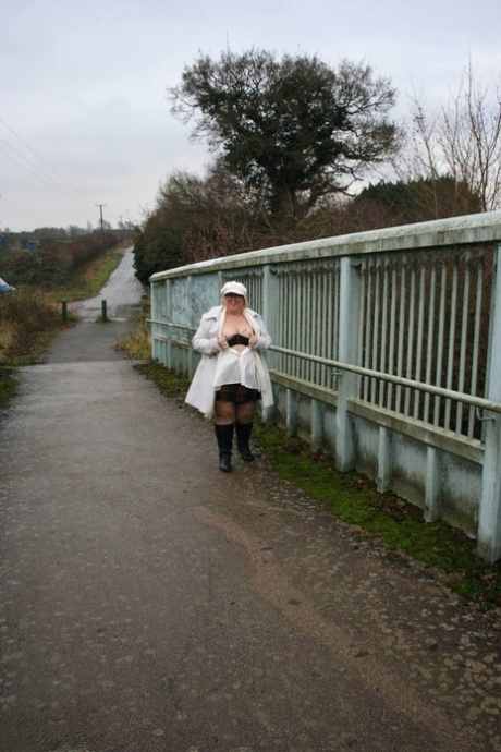 Exposed: UK fat woman Lexie Cummings poses with her big ass on a bridge for pedestrians.