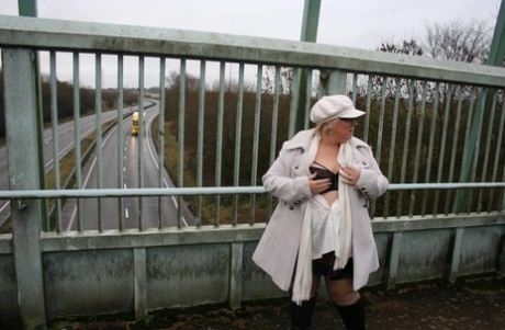 An example of this is Lexie Cummings from the UK who shows off her big ass on a pedestrian bridge, having been raised on a fat woman's