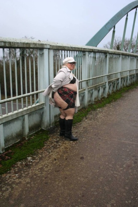 UK fatty Lexie Cummings shows her big ass on an pedestrian bridge