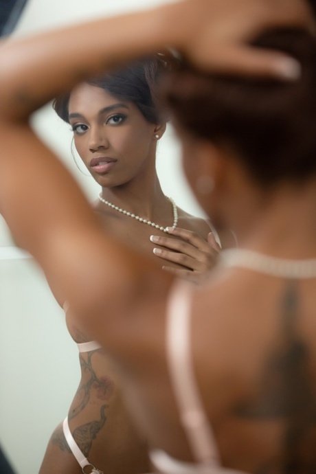 No makeup, just lacey London, the beautiful 'ocean gown' with an ebony eye design, gets completely naked in front of a mirror.