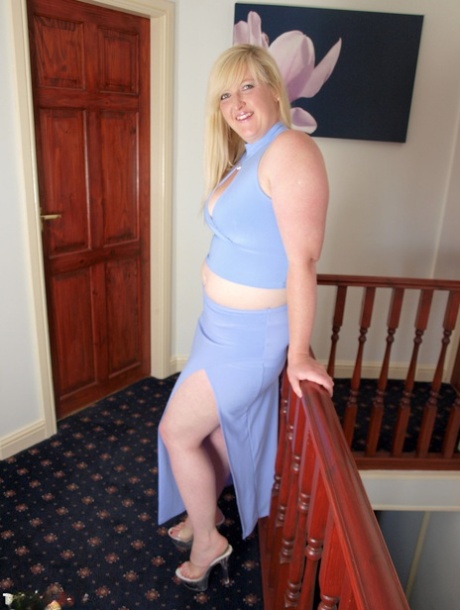 The first nude shoot for Samantha involves her plumper, blonde self-portrait stripping down to her heels.