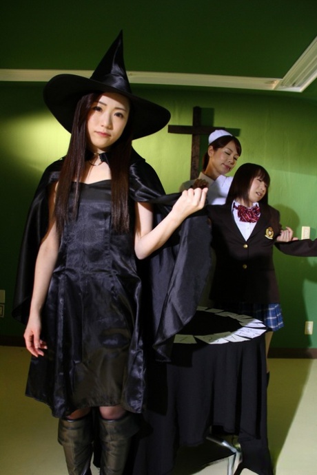 Stylish Japanese girls practice the dark arts by dressing up in cosplay attire.