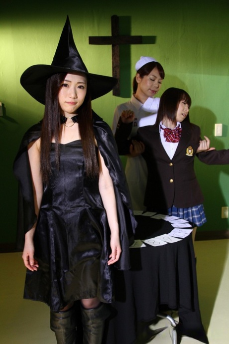 In Japan, young women practice the dark arts by dressing up in cosplay attire.