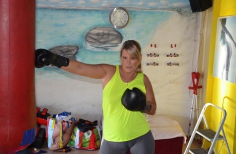 Middle-aged Blonde Sweet Susi Gets Naked After Working Out With A Punching Bag
