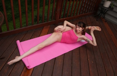 The act of practicing yoga on a deck prompts Lana Smalls, a young girl with flexibility, to get naked.
