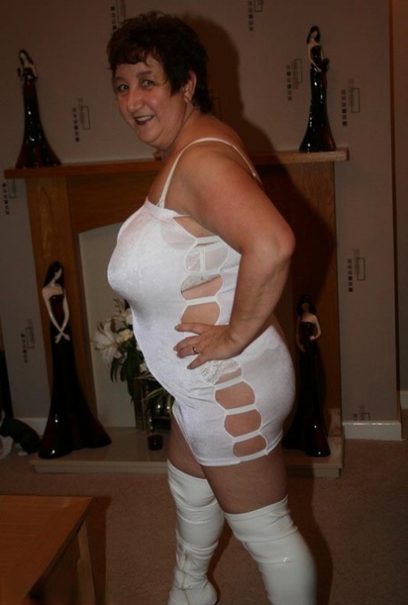 Old Amateur Kinky Carol Greets Her Toy Boy In A Revealing Dress And OTK Boots