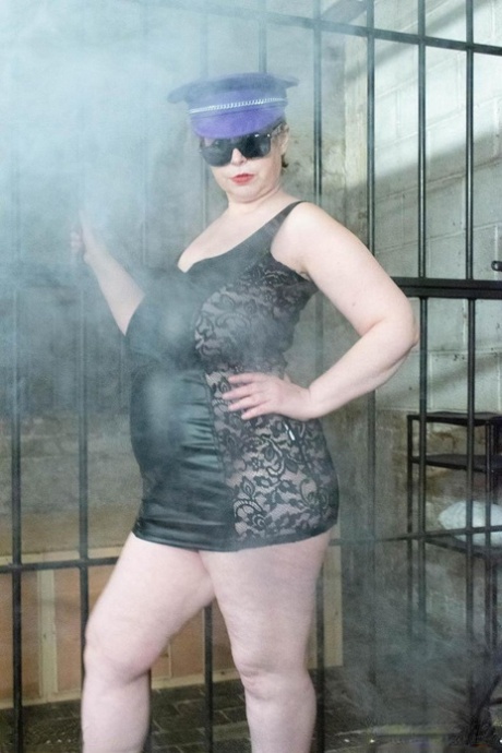 British Fatty Posh Sophia Models Fetish Wear In And Out Of A Jail Cell