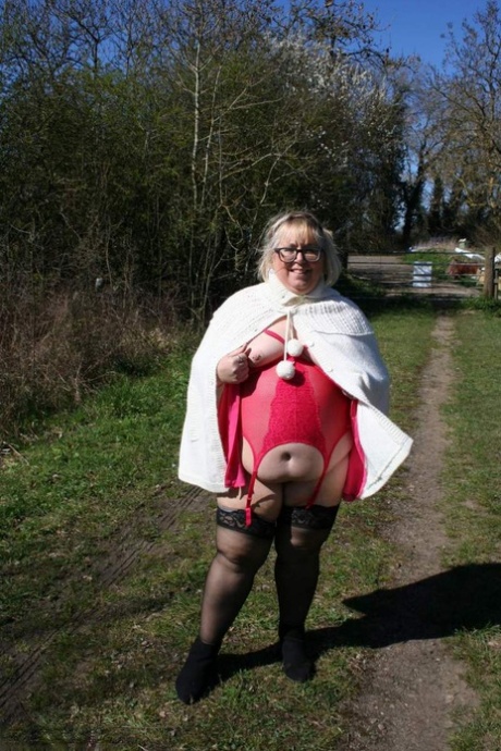 A field where Lexie Cummings, an obese British blonde, displays her tits and large buttocks is a topic of discussion.
