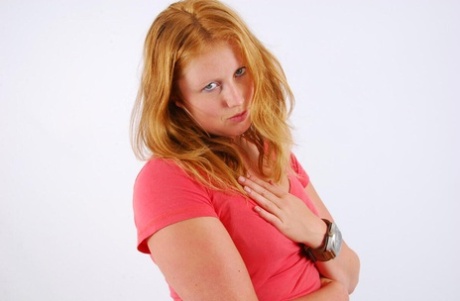Natural Redhead Judy Displays Her Huge OOZOO Cuff Watch While Fully Clothed