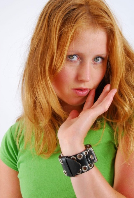 During the SFW action, Judy (an naturally reddish blonde) models herself on a double buckle watch with cuffs.