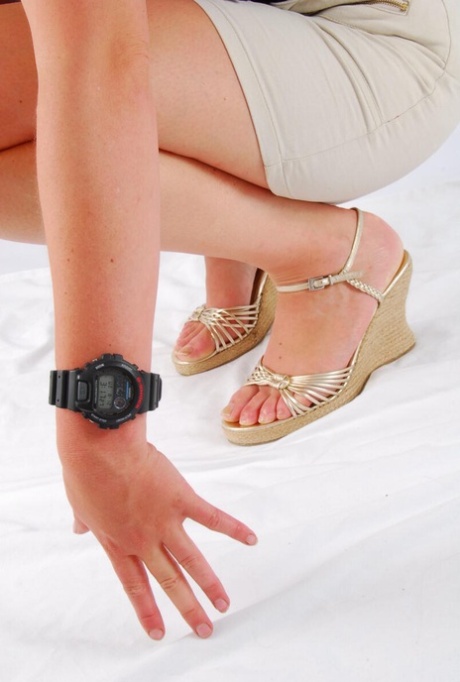 Natural Redhead Judy Models A Black G-Shock Watch While Fully Clothed