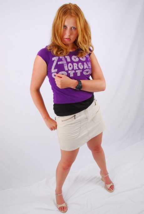 Natural Redhead Judy Models A Black G-Shock Watch While Fully Clothed