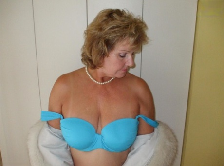 Solo Granny Busty Bliss Looses Her Tan Lined Tits From A Fur Coat
